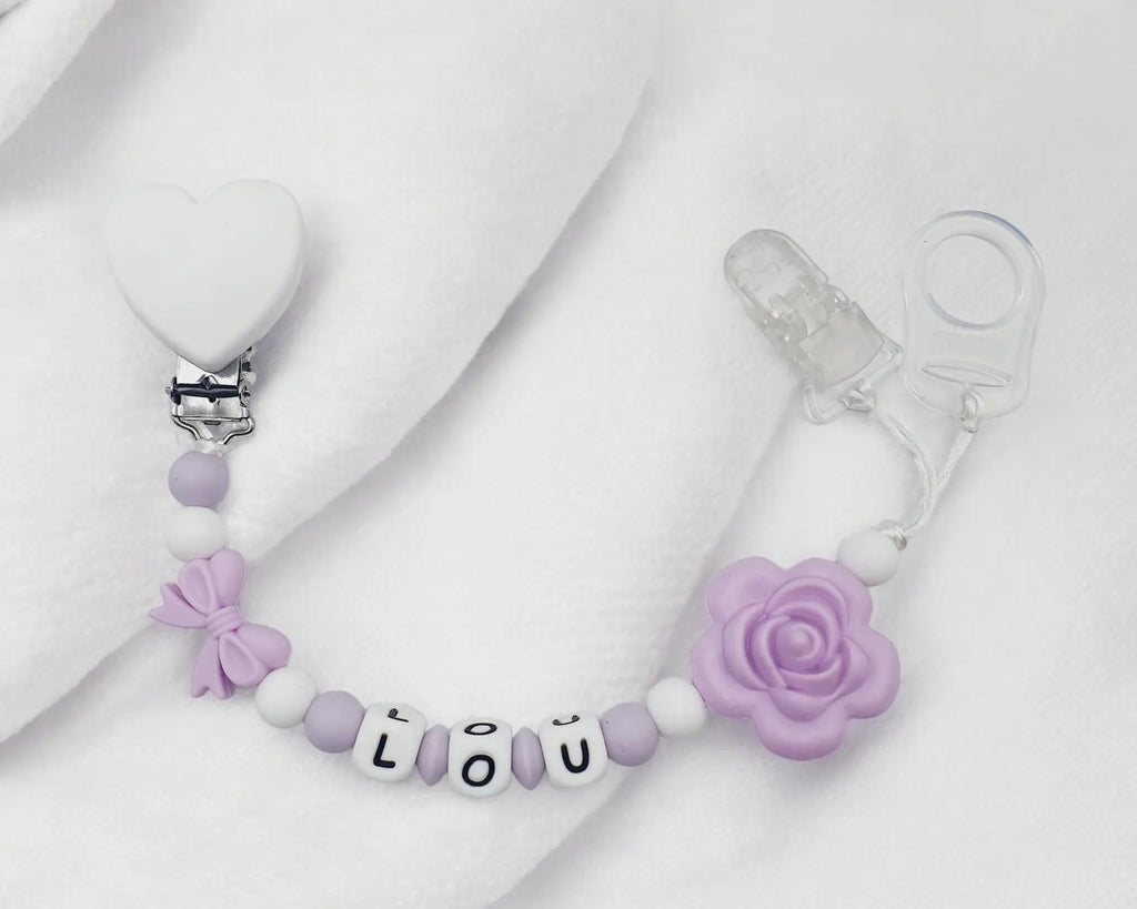 Attache tétine fleur silicone