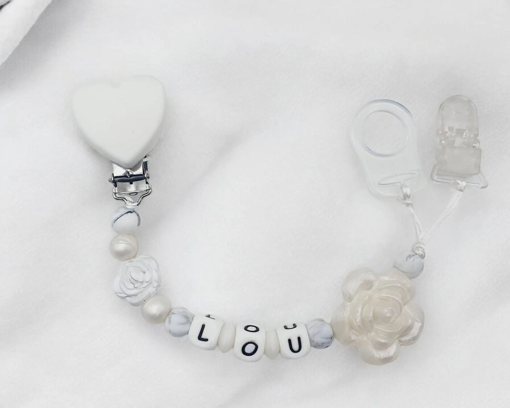 Attache tétine fleur silicone