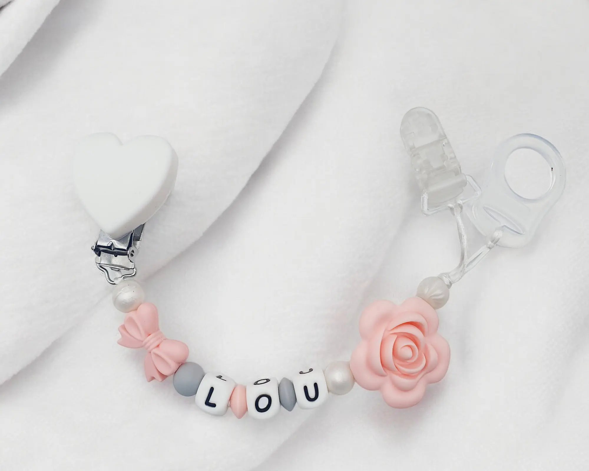Attache tétine fleur silicone