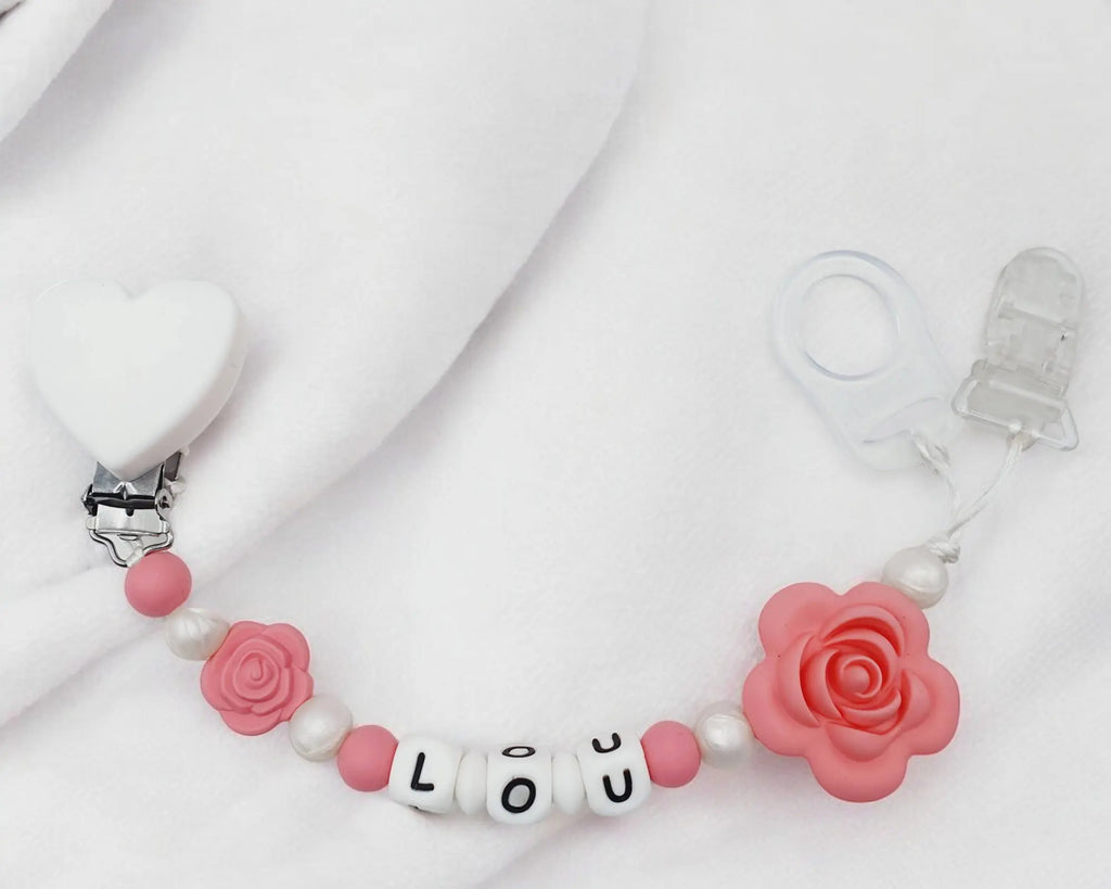 Attache tétine fleur silicone