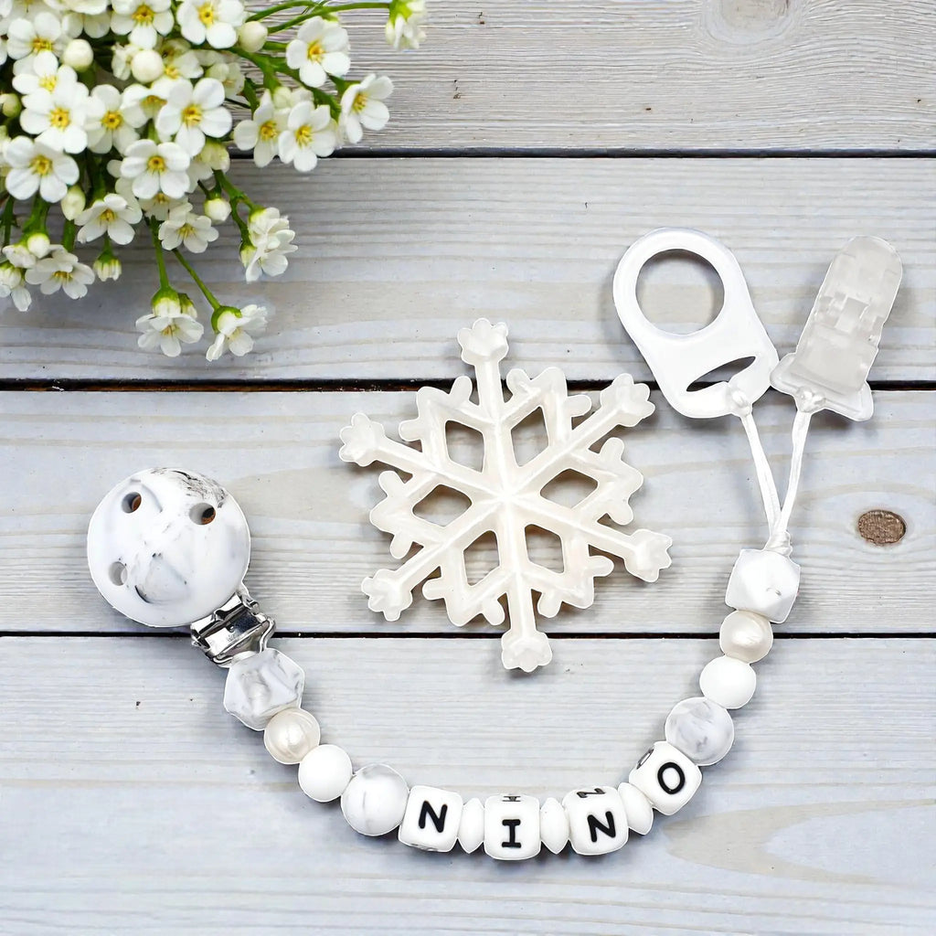 Attache tétine flocon neige silicone