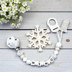 Attache tétine flocon neige silicone