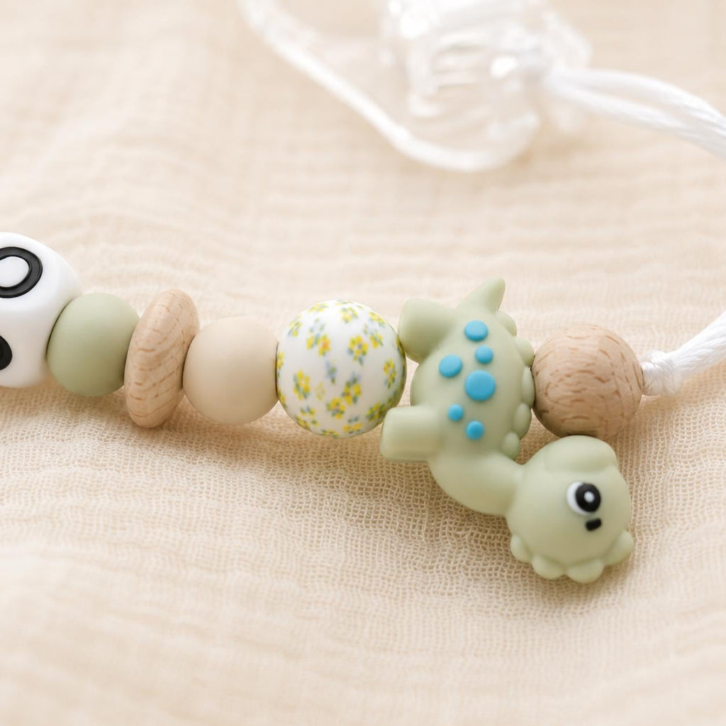 Attache sucette personnalisée dinosaure – silicone et bois – vue 4