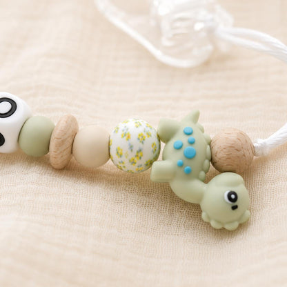 Attache sucette personnalisée dinosaure – silicone et bois – vue 4