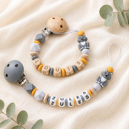 Attache sucette personnalisée loup gris et orange en silicone – photo principale