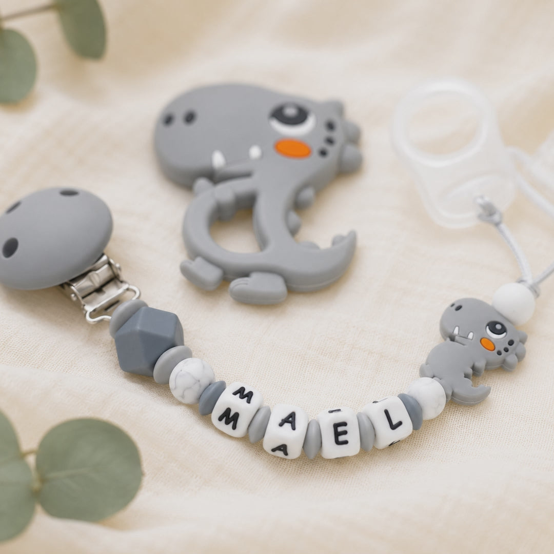 Attache sucette personnalisée dinosaure gris ou vert – silicone